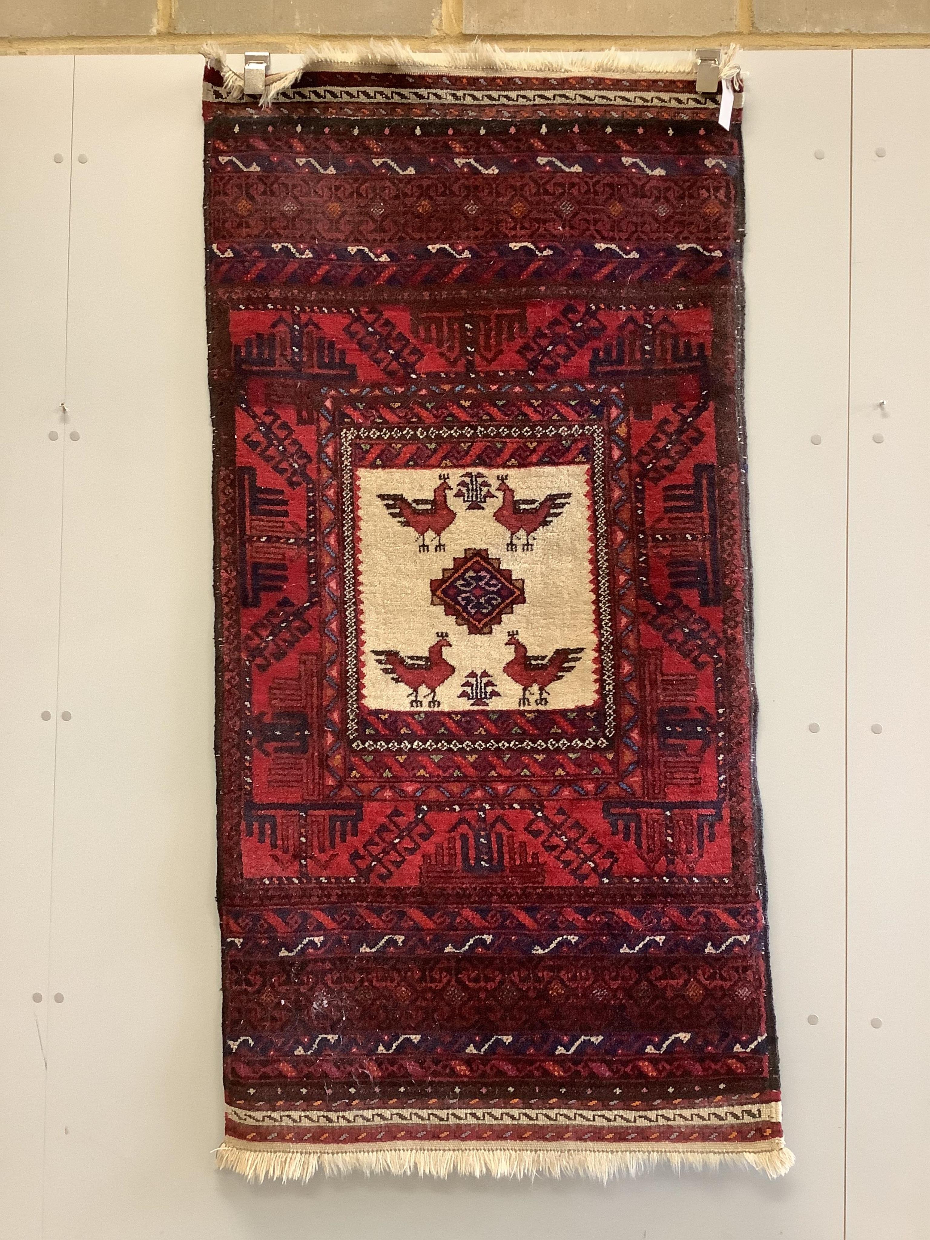 An Afghan rug, 164 x 82cm. Condition - fair